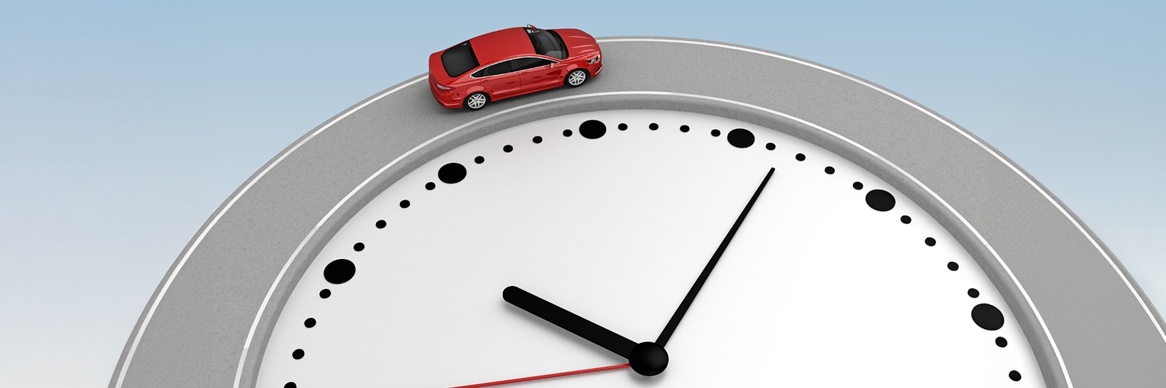Image of a car driving on a clock